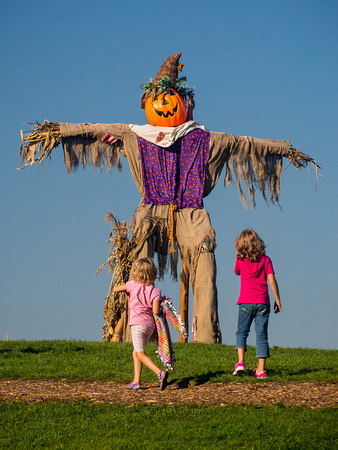 Little kids, Big scarecrow